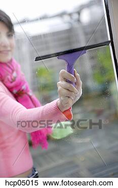 Stock Image - woman cleaning 
window. fotosearch 
- search stock 
photos, pictures, 
images, and photo 
clipart
