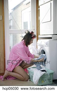 Stock Photography - woman doing laundry. 
fotosearch - search 
stock photos, 
pictures, images, 
and photo clipart