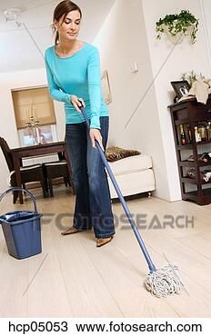 Stock Photo - woman mopping 
floor. fotosearch 
- search stock 
photos, pictures, 
images, and photo 
clipart