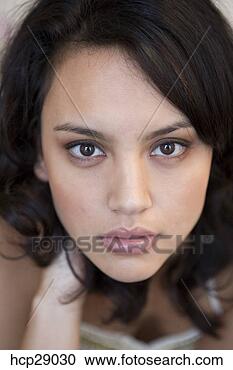 Stock Photography - close up of young 
woman with fixed 
gaze. fotosearch 
- search stock 
photos, pictures, 
images, and photo 
clipart