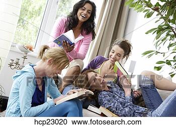 Stock Photography - laughing women 
in book club. 
fotosearch - search 
stock photos, 
pictures, images, 
and photo clipart