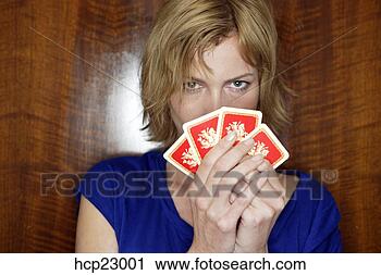 Stock Photography - woman holding 
playing cards. 
fotosearch - search 
stock photos, 
pictures, images, 
and photo clipart