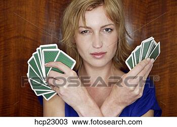 Stock Photo - woman holding 
playing cards. 
fotosearch - search 
stock photos, 
pictures, images, 
and photo clipart