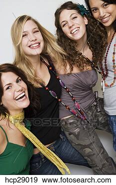 Stock Photograph - young women laughing 
together. fotosearch 
- search stock 
photos, pictures, 
images, and photo 
clipart