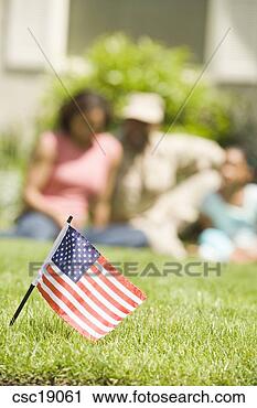 Stock Photography - american flag 
stuck in lawn. 
fotosearch - search 
stock photos, 
pictures, images, 
and photo clipart