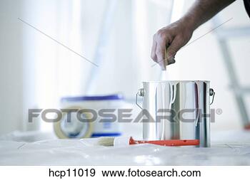 Stock Photograph - man mixing paint. 
fotosearch - search 
stock photos, 
pictures, images, 
and photo clipart