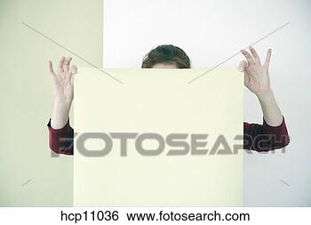 Stock Photo - woman putting 
up wallpaper. 
fotosearch - search 
stock photos, 
pictures, images, 
and photo clipart