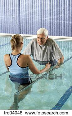Stock Photo - man having physical 
therapy in pool. 
fotosearch - search 
stock photos, 
pictures, images, 
and photo clipart