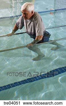 Stock Photography - man having physical 
therapy in pool. 
fotosearch - search 
stock photos, 
pictures, images, 
and photo clipart
