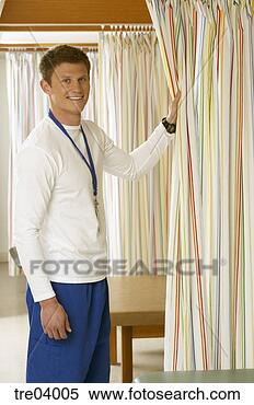 Stock Image - man pulling striped 
curtains. fotosearch 
- search stock 
photos, pictures, 
images, and photo 
clipart
