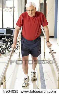Stock Image - man using bars 
to walk. fotosearch 
- search stock 
photos, pictures, 
images, and photo 
clipart