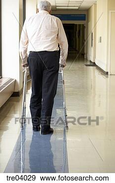 Stock Photograph - senior man using 
walker in hospital. 
fotosearch - search 
stock photos, 
pictures, images, 
and photo clipart