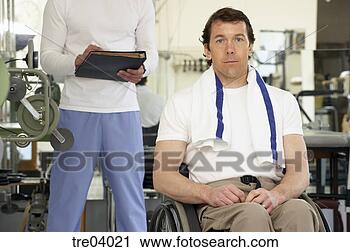Stock Photography - wheelchair-bound 
man at gym. fotosearch 
- search stock 
photos, pictures, 
images, and photo 
clipart
