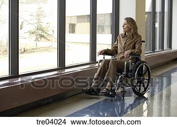 Stock Photo - wheelchair-bound 
woman looking 
out window. fotosearch 
- search stock 
photos, pictures, 
images, and photo 
clipart