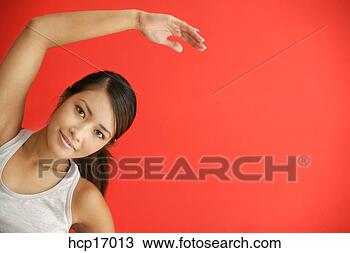 Stock Photo - asian woman stretching. 
fotosearch - search 
stock photos, 
pictures, images, 
and photo clipart