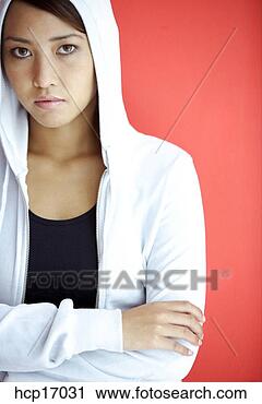 Stock Photography - asian woman wearing 
hooded sweatshirt. 
fotosearch - search 
stock photos, 
pictures, images, 
and photo clipart