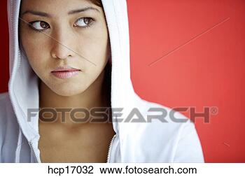 Stock Photo - young asian woman 
wearing hooded 
sweatshirt. fotosearch 
- search stock 
photos, pictures, 
images, and photo 
clipart