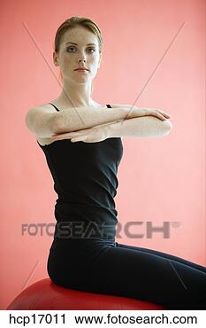 Stock Photography - young woman crossing 
arms. fotosearch 
- search stock 
photos, pictures, 
images, and photo 
clipart