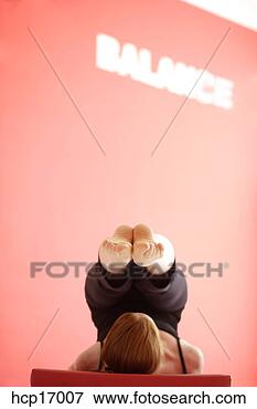 Picture - young woman stretching. 
fotosearch - search 
stock photos, 
pictures, images, 
and photo clipart