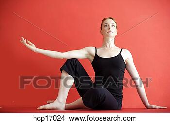 Stock Photo - young woman stretching. 
fotosearch - search 
stock photos, 
pictures, images, 
and photo clipart