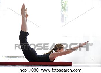 Stock Photography - young woman stretching. 
fotosearch - search 
stock photos, 
pictures, images, 
and photo clipart