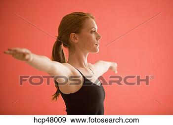 Stock Photograph - young woman stretching. 
fotosearch - search 
stock photos, 
pictures, images, 
and photo clipart