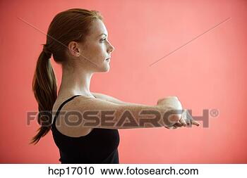 Stock Photography - young woman doing 
yoga. fotosearch 
- search stock 
photos, pictures, 
images, and photo 
clipart