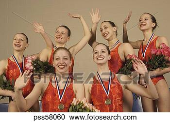 Stock Photography - swim team waving 
in celebration. 
fotosearch - search 
stock photos, 
pictures, images, 
and photo clipart