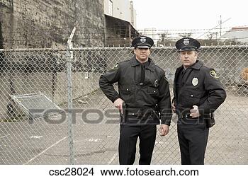 Banco de Imagem - macho,  polícia, 
 oficiais,  batida. 
fotosearch - busca 
de fotos, imagens 
e clipart