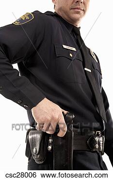 Banco de Imagem - macho,  polícia, 
 oficial,  alcançar, 
 seu,  coldre. 
fotosearch - busca 
de fotos, imagens 
e clipart