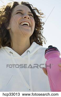 Banco de Imagem - mulher,  rir, 
 água,  garrafa. 
fotosearch - busca 
de fotos, imagens 
e clipart
