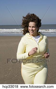 Banco de Imagem - mulher,  sacudindo, 
 praia. fotosearch 
- busca de fotos, 
imagens e clipart