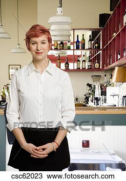 Stock Photo - female server 
at restaurant. 
fotosearch - search 
stock photos, 
pictures, images, 
and photo clipart