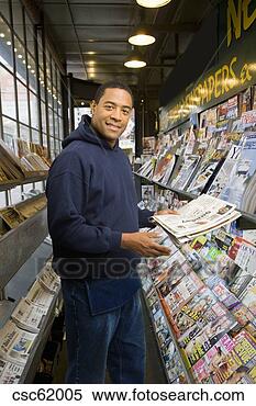 Banco de Imagem - jornal,  levantar. 
fotosearch - busca 
de fotos, imagens 
e clipart