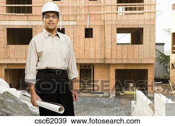 Stock Photograph - male architect 
wearing hard hat. 
fotosearch - search 
stock photos, 
pictures, images, 
and photo clipart