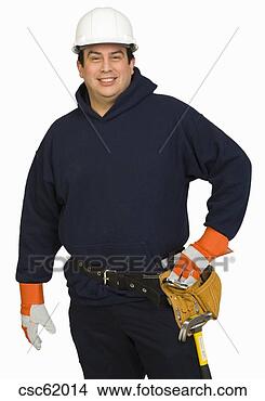 Stock Photo - male construction 
worker wearing 
hard hat. fotosearch 
- search stock 
photos, pictures, 
images, and photo 
clipart