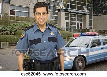 Stock Image - male police officer 
in front of car. 
fotosearch - search 
stock photos, 
pictures, images, 
and photo clipart