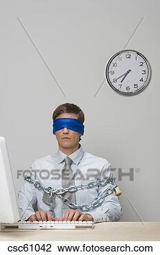 Stock Photo - businessman blindfolded 
and chained. fotosearch 
- search stock 
photos, pictures, 
images, and photo 
clipart