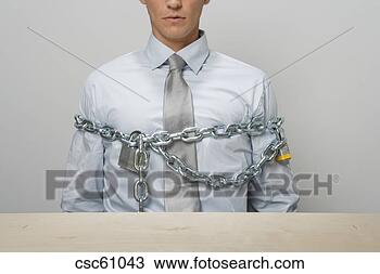 Stock Photo - businessman chained 
and locked. fotosearch 
- search stock 
photos, pictures, 
images, and photo 
clipart