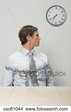 Stock Photo - businessman chained 
and locked. fotosearch 
- search stock 
photos, pictures, 
images, and photo 
clipart