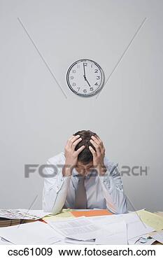 Stock Photograph - businessman with 
head in hands. 
fotosearch - search 
stock photos, 
pictures, images, 
and photo clipart