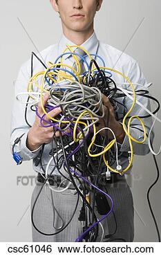 Stock Photo - businessman holding 
tangle of computer 
wires. fotosearch 
- search stock 
photos, pictures, 
images, and photo 
clipart