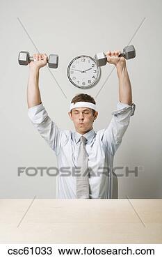 Stock Photo - businessman lifting 
weights. fotosearch 
- search stock 
photos, pictures, 
images, and photo 
clipart