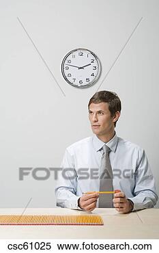 Stock Image - businessman next 
to row of pencils. 
fotosearch - search 
stock photos, 
pictures, images, 
and photo clipart