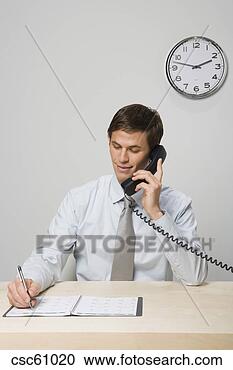 Stock Photography - businessman talking 
on telephone. 
fotosearch - search 
stock photos, 
pictures, images, 
and photo clipart
