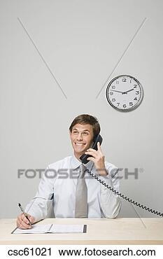 Stock Photography - businessman talking 
on telephone. 
fotosearch - search 
stock photos, 
pictures, images, 
and photo clipart