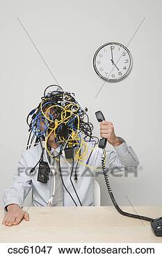 Picture - businessman with 
tangle of computer 
wires on head. 
fotosearch - search 
stock photos, 
pictures, images, 
and photo clipart
