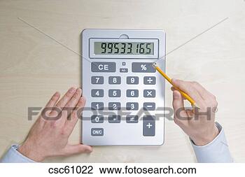 Stock Photo - businessman using 
calculator. fotosearch 
- search stock 
photos, pictures, 
images, and photo 
clipart