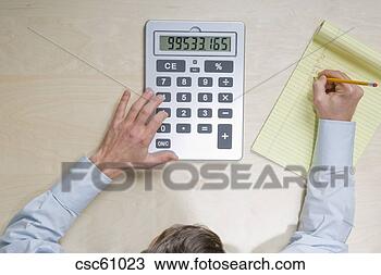 Stock Photo - businessman using 
calculator. fotosearch 
- search stock 
photos, pictures, 
images, and photo 
clipart