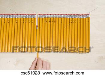 Stock Photo - hand pulling pencil 
out of row. fotosearch 
- search stock 
photos, pictures, 
images, and photo 
clipart